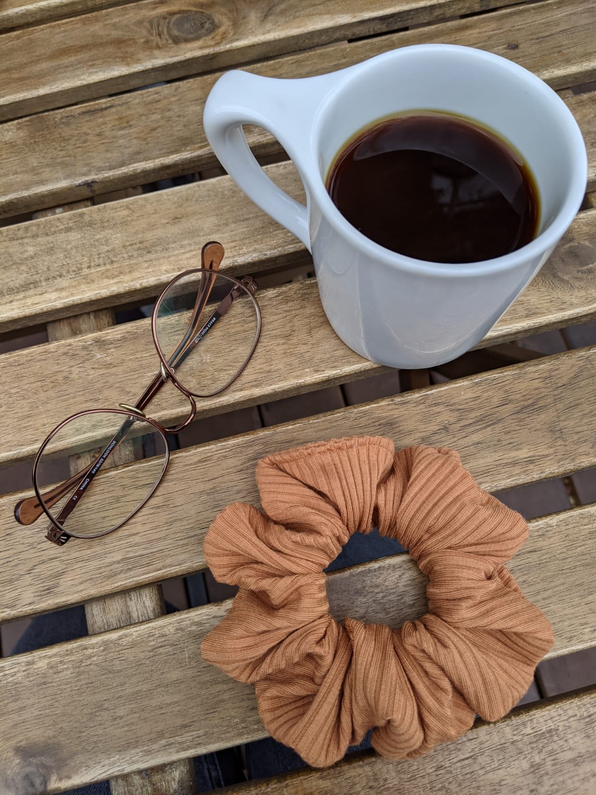 Toffee Scrunchie with a cup of coffee and glasses