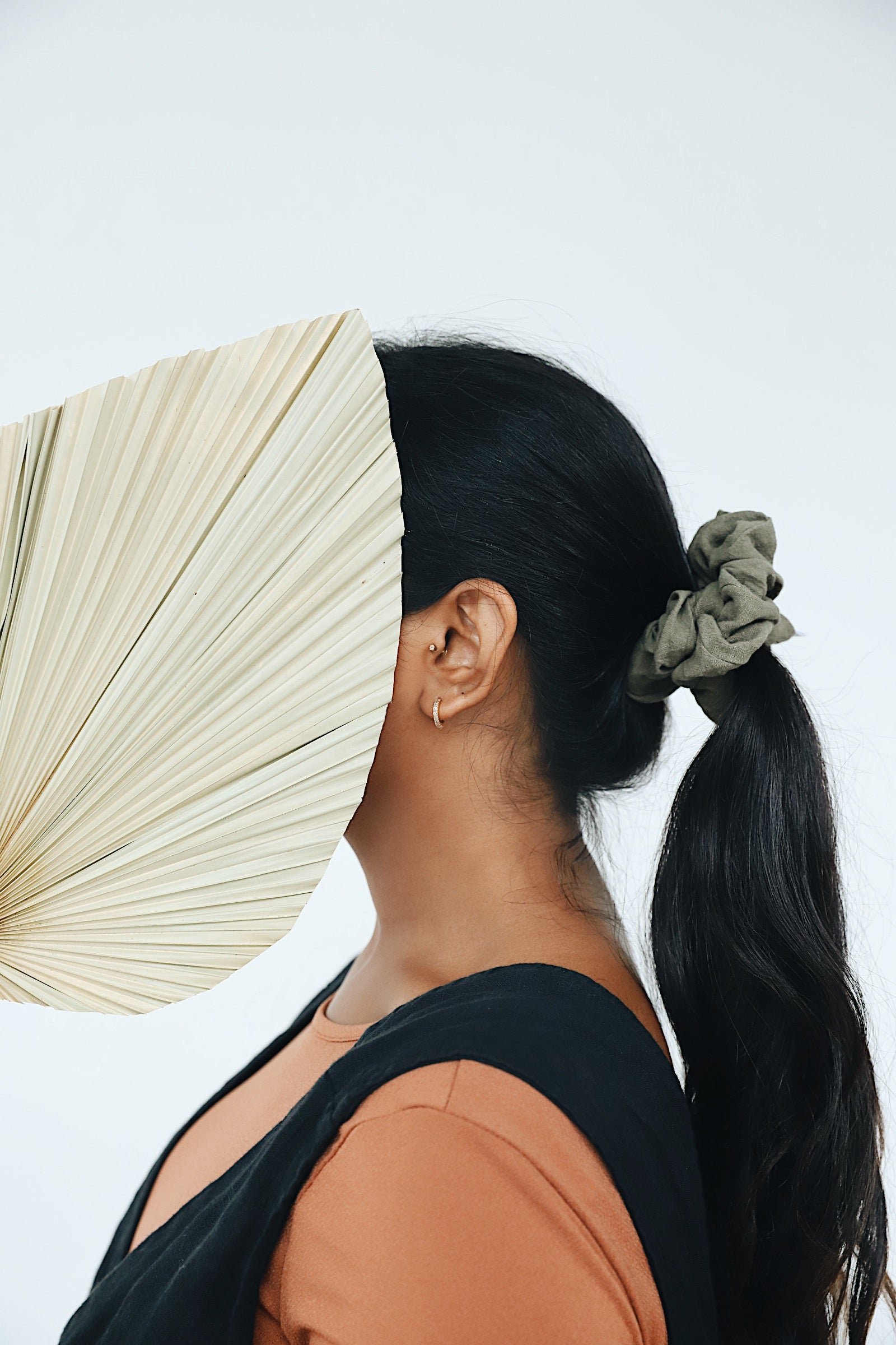 Dark Olive Linen Scrunchie in model's ponytail