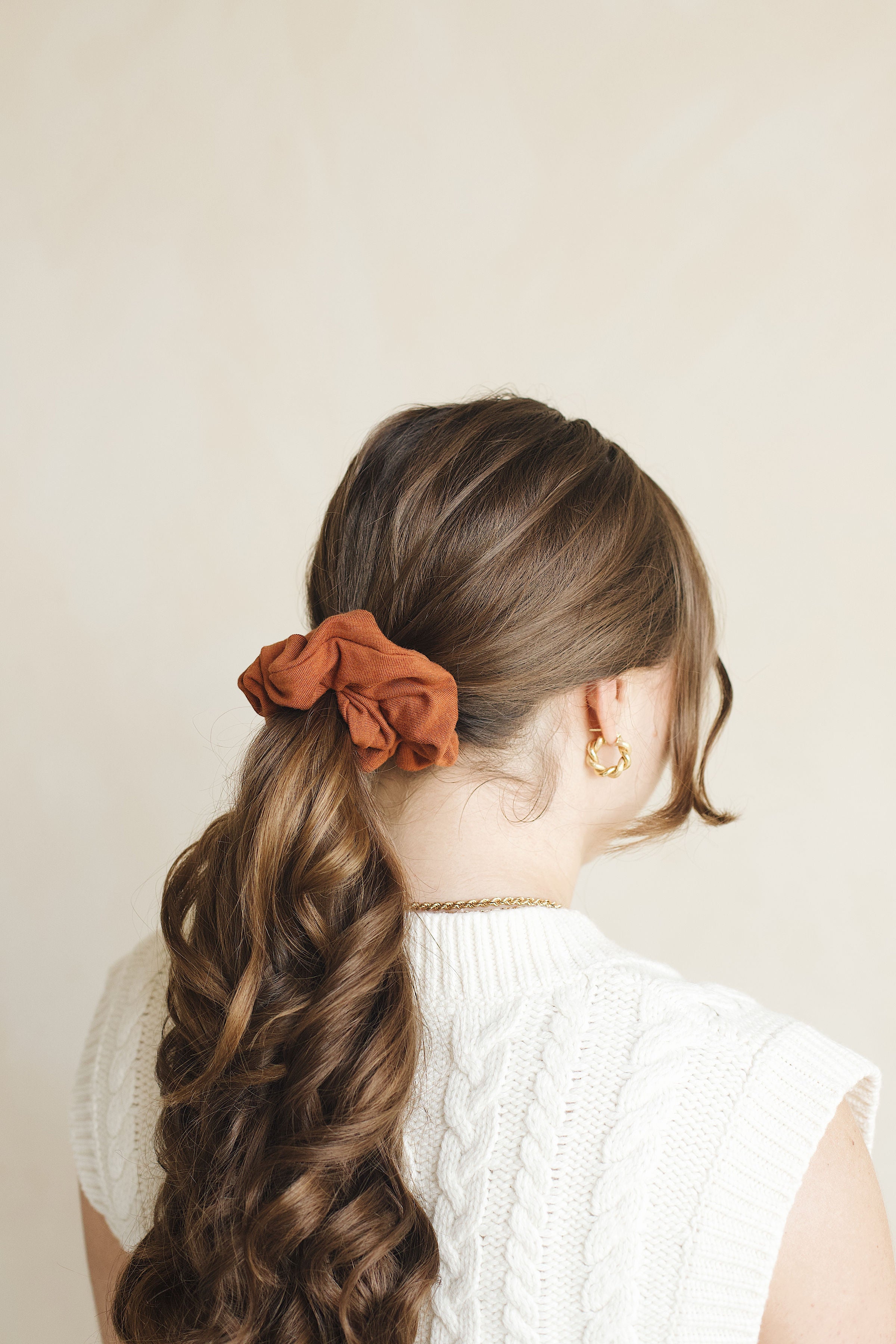 Burnt Orange Scrunchie in model's hair