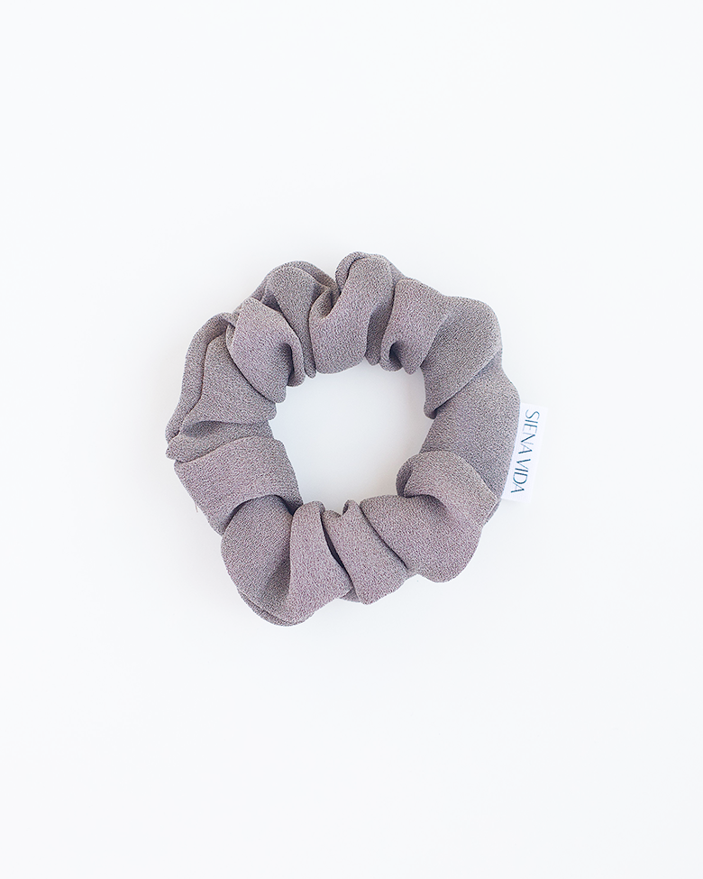 Clay viscose scrunchie on a white background