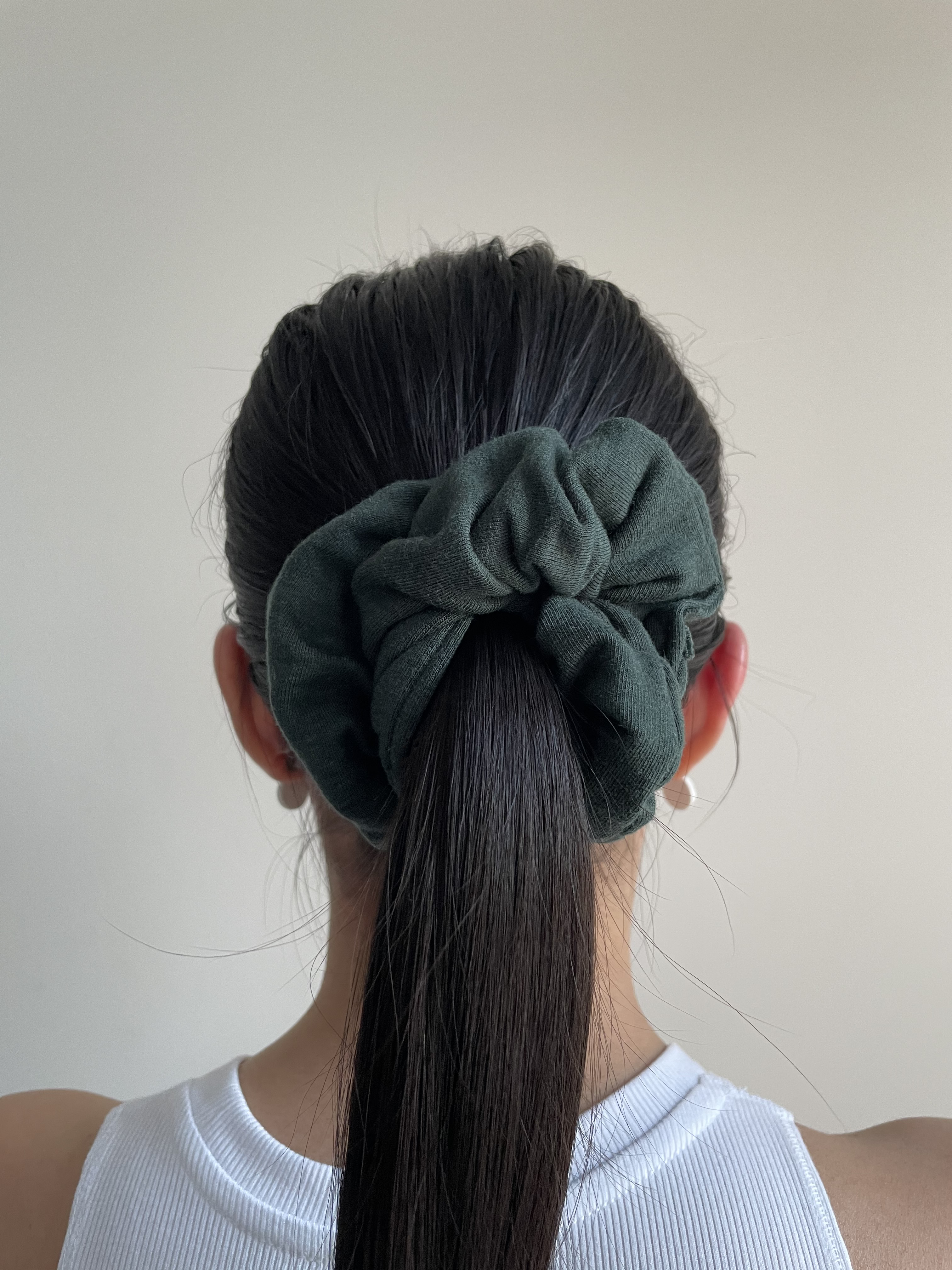 Siena Vida Forest Sweater Scrunchie in Classic size in model's ponytail.
